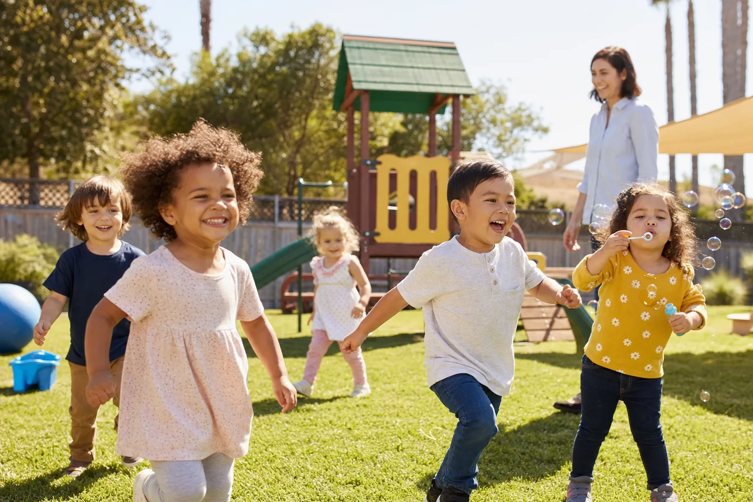 Kids playing outdoors in the daycare yard